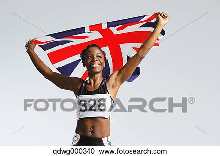 Female Athlete Holding a British Flag View Large Photo Image Stock Image - Female Athlete Holding a British Flag. Fotosearch