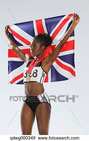 Female Athlete Holding a British Flag View Large Photo Image Stock Photo - Female Athlete Holding a British Flag. Fotosearch
