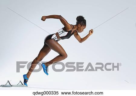 Stock Photography - Female Athlete Leaving Starting Block . Fotosearch