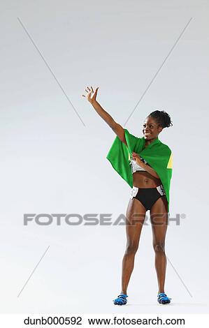 Female Athlete Wearing a Brazilian Flag View Large Photo Image Stock Image - Female Athlete Wearing a Brazilian Flag. Fotosearch
