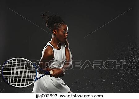Female Tennis Player, Backhand Shot View Large Photo Image Stock Photo - Female Tennis Player, Backhand Shot. Fotosearch