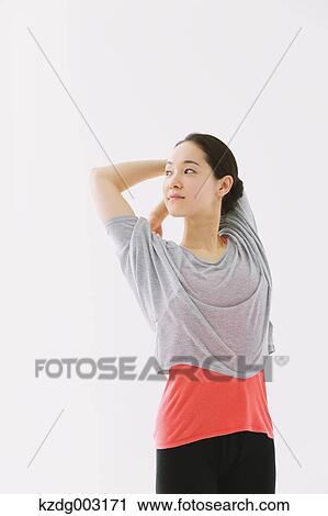 Stock Image - Japanese woman training. Fotosearch