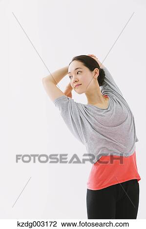 Stock Image - Japanese woman training. Fotosearch