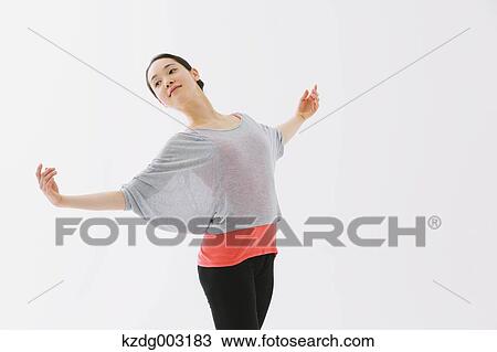 Stock Image - Japanese woman training. Fotosearch