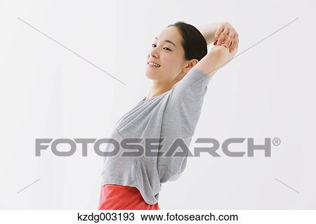 Stock Image - Japanese woman training. Fotosearch