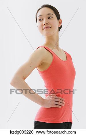 Stock Image - Japanese woman training. Fotosearch