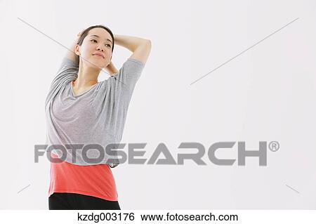 Stock Photograph - Japanese woman training. Fotosearch