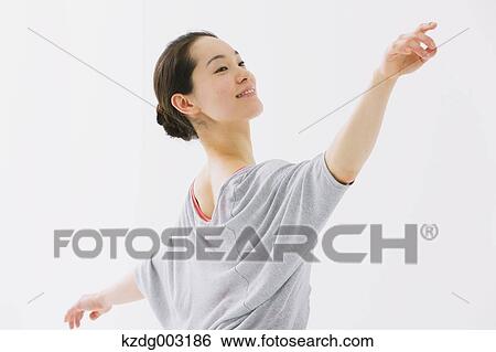 Stock Photograph - Japanese woman training. Fotosearch