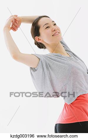 Stock Photograph - Japanese woman training. Fotosearch