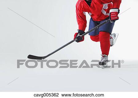 Male hockey player View Large Photo Image Stock Image - Male hockey player. Fotosearch