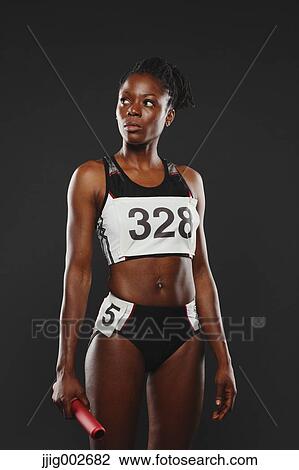 Portrait of African Female Runner Holding Relay Baton View Large Photo Image Stock Image - Portrait of African Female Runner Holding Relay Baton. Fotosearch