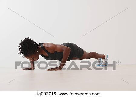Woman Doing Push-Up View Large Photo Image Stock Photography - Woman Doing Push-Up . Fotosearch