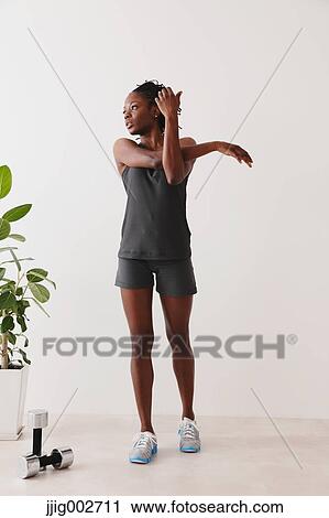 Woman Exercising View Large Photo Image Stock Image - Woman Exercising. Fotosearch