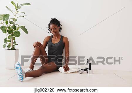 Woman Relaxing While Exercising View Large Photo Image Stock Image - Woman Relaxing While Exercising . Fotosearch
