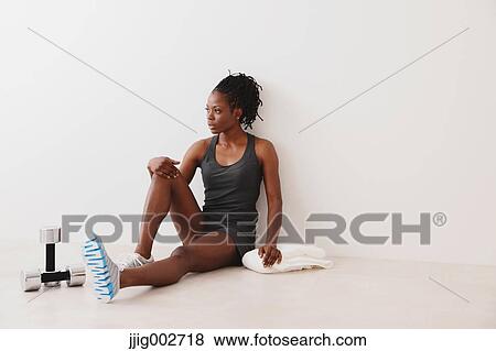 Woman Relaxing While Exercising View Large Photo Image Stock Photo - Woman Relaxing While Exercising . Fotosearch