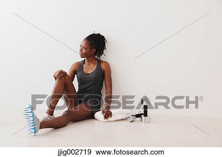 Woman Relaxing While Exercising View Large Photo Image Stock Photo - Woman Relaxing While Exercising . Fotosearch
