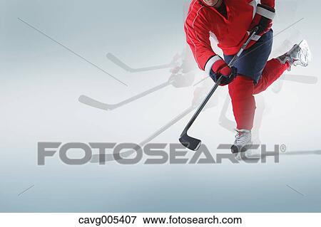 Stock Photo - Young Male Ice Hockey Player. Fotosearch