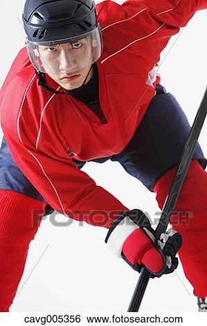 Stock Photograph - Young Male Ice Hockey Player. Fotosearch