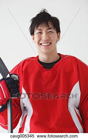 Stock Photography - Young Male Ice Hockey Player. Fotosearch