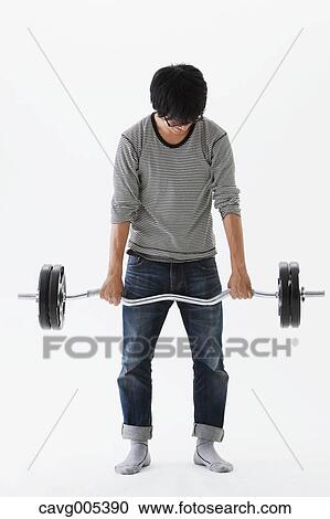 Young Man Doing Physical Exercise View Large Photo Image Stock Image - Young Man Doing Physical Exercise. Fotosearch