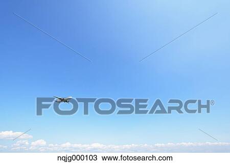 Airplane flying in the sky View Large Photo Image Stock Image - Airplane flying in the sky. Fotosearch