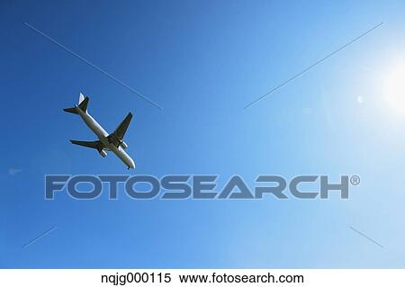 Airplane flying in the sky View Large Photo Image Stock Photography - Airplane flying in the sky. Fotosearch