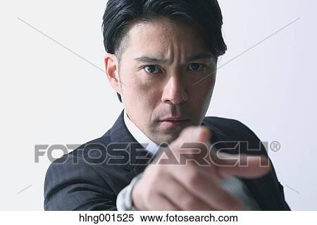 Stock Photography - Angry Japanese businessman. Fotosearch
