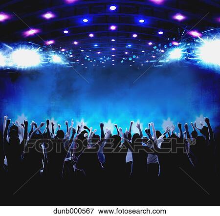 Stock Photo - Audience enjoying live concert. Fotosearch
