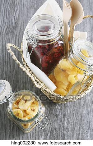 Stock Image - Bottled dry fruits. Fotosearch