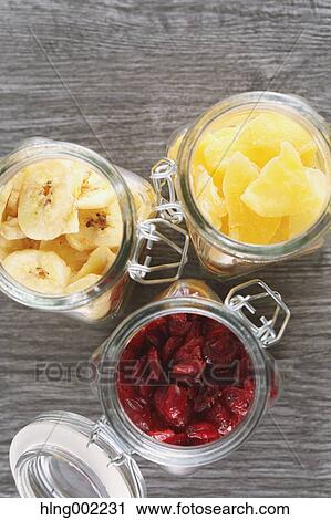 Stock Image - Bottled dry fruits. Fotosearch