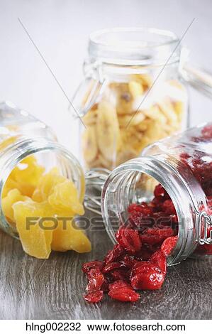 Bottled dry fruits View Large Photo Image Stock Image - Bottled dry fruits. Fotosearch