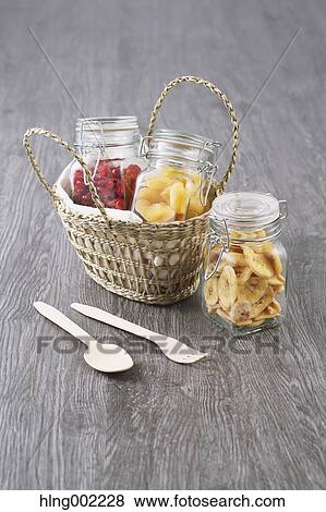 Bottled dry fruits View Large Photo Image Stock Photo - Bottled dry fruits. Fotosearch