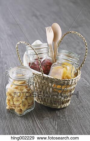 Bottled dry fruits View Large Photo Image Stock Photo - Bottled dry fruits. Fotosearch