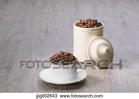 Coffee beans in a cup View Large Photo Image Stock Image - Coffee beans in a cup. Fotosearch