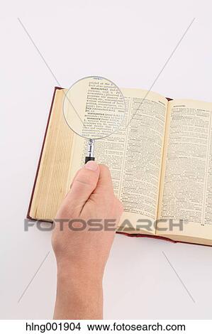 Dictionary and magnifying glass View Large Photo Image Picture - Dictionary and magnifying glass. Fotosearch