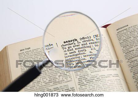 Dictionary and magnifying glass View Large Photo Image Stock Image - Dictionary and magnifying glass. Fotosearch