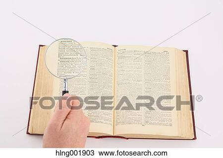 Dictionary and magnifying glass View Large Photo Image Stock Image - Dictionary and magnifying glass. Fotosearch