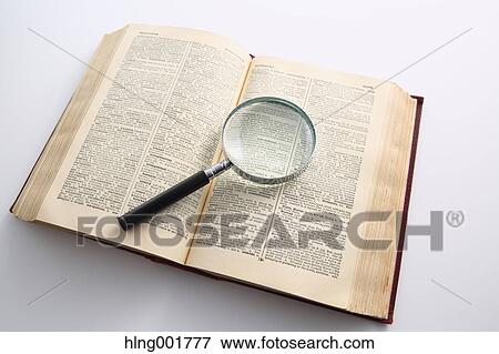 Dictionary and magnifying glass View Large Photo Image Stock Photo - Dictionary and magnifying glass. Fotosearch
