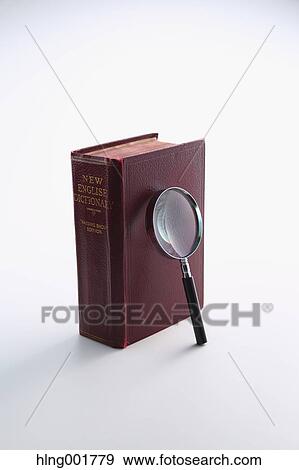 Dictionary and magnifying glass View Large Photo Image Stock Photo - Dictionary and magnifying glass. Fotosearch