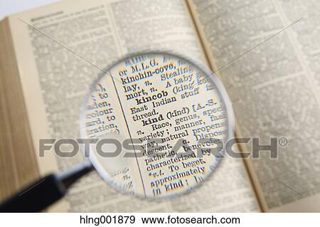 Stock Photo - Dictionary and magnifying glass. Fotosearch