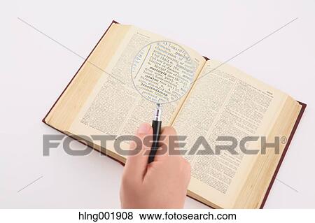 Dictionary and magnifying glass View Large Photo Image Stock Photo - Dictionary and magnifying glass. Fotosearch