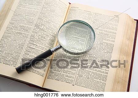 Dictionary and magnifying glass View Large Photo Image Stock Photograph - Dictionary and magnifying glass. Fotosearch