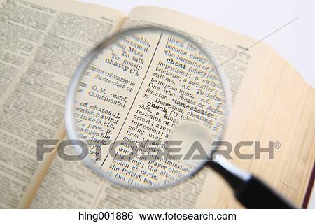 Dictionary and magnifying glass View Large Photo Image Stock Photograph - Dictionary and magnifying glass. Fotosearch