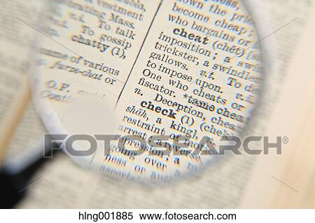 Stock Photography - Dictionary and magnifying glass. Fotosearch