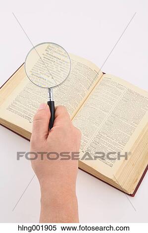 Dictionary and magnifying glass View Large Photo Image Stock Photography - Dictionary and magnifying glass. Fotosearch