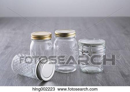 Stock Image - Glass jars. Fotosearch
