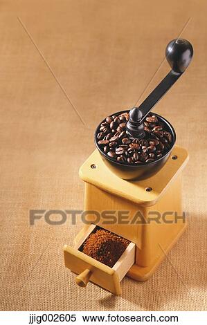 Hand-grinding coffee mill View Large Photo Image Stock Photography - Hand-grinding coffee mill. Fotosearch