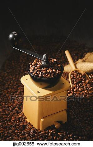Hand-grinding coffee mill View Large Photo Image Stock Photography - Hand-grinding coffee mill. Fotosearch