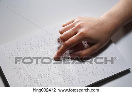 Hand reading Braille paper View Large Photo Image Stock Image - Hand reading Braille paper. Fotosearch