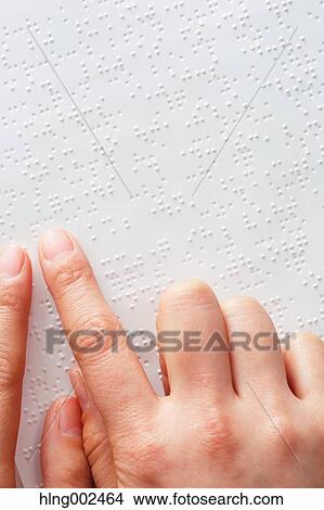 Hands reading Braille paper View Large Photo Image Picture - Hands reading Braille paper. Fotosearch